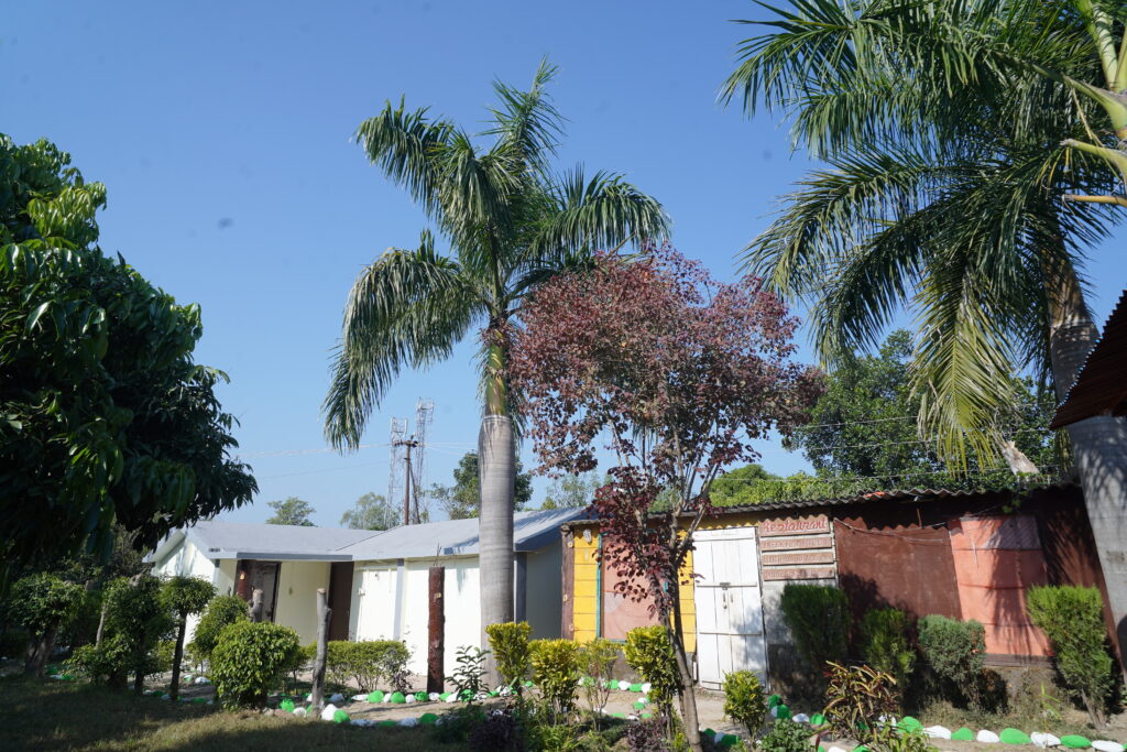 Homestay in Jim Corbett - Corbett Tiger reserve - Lush green Lawn for guest to enjoy.